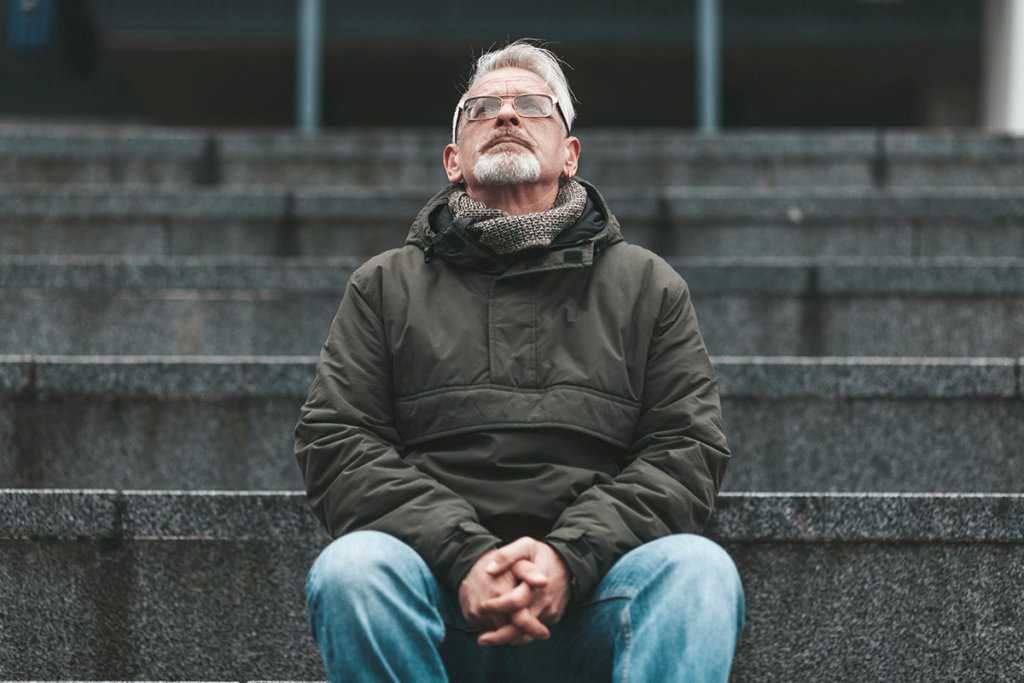 Man thinking about his addiction and trauma conditions