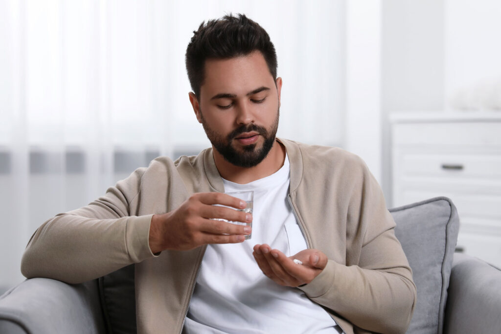 A man wondering, "How long does Adderall stay in your system?"