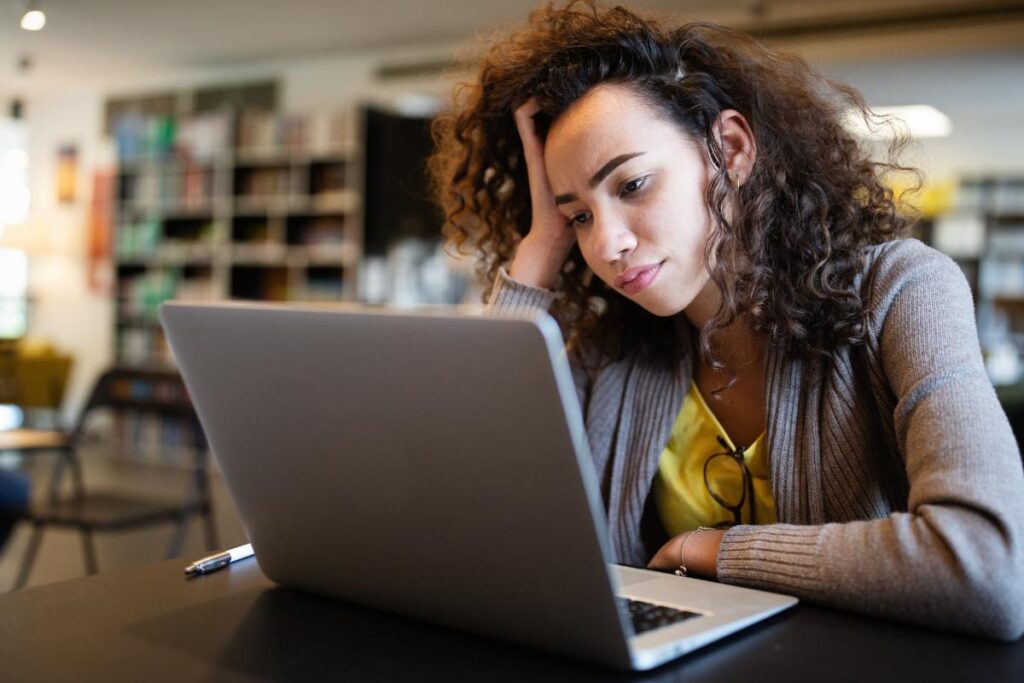 A woman reading about inattentive ADHD